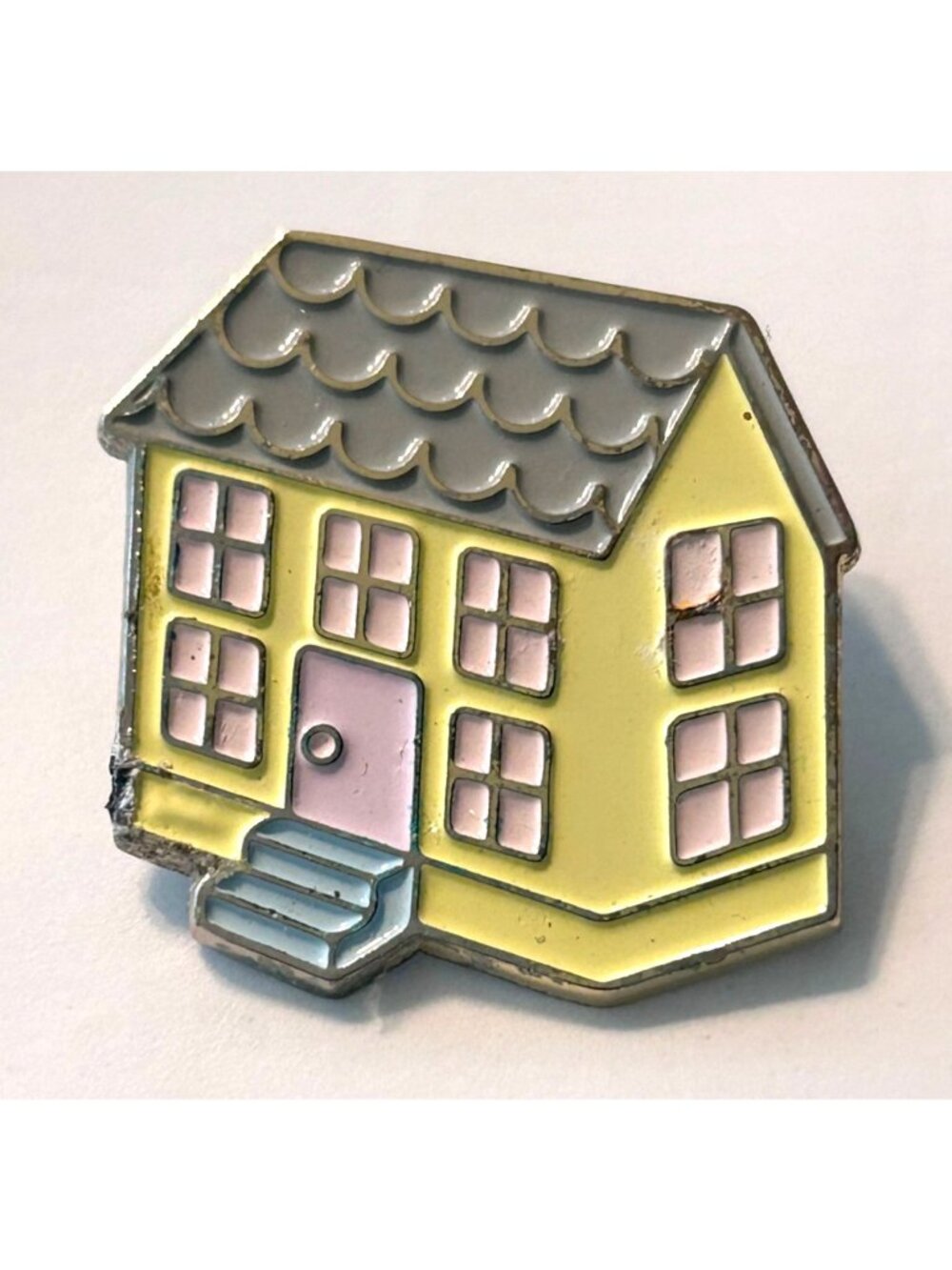 Melanie Martinez Dollhouse Lapel Pin from the Crybaby pin pack